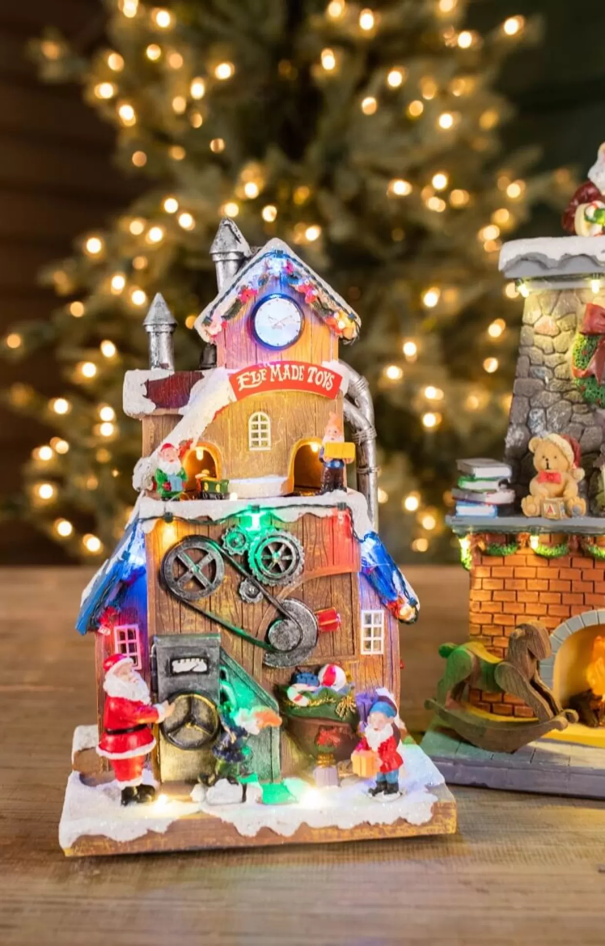 Decorator's Warehouse 11.4” H B/O Lighted Musical Santa’s Toy Factory With Moving Train